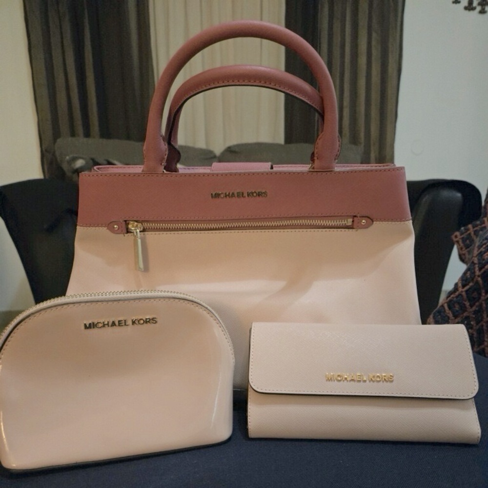 Pink Michael Kors purse with wallet and small bag